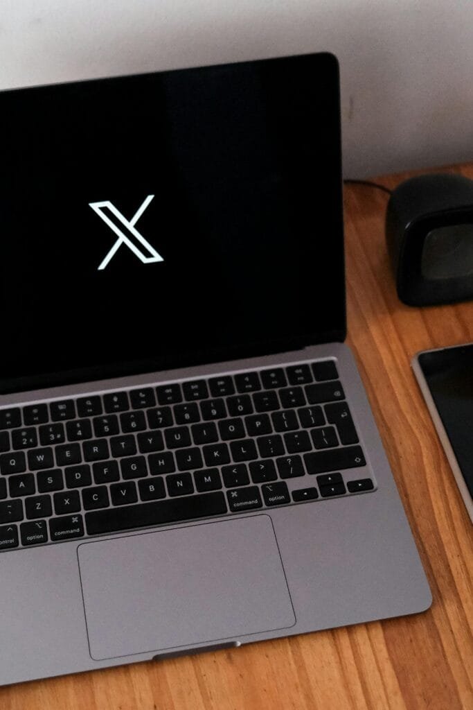 pexels-photo-19826625-19826625 Laptop with Social Media Icon on Desk